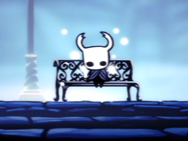 The same Knight and bench crop with VHS’s softer edges and altered color boundaries.